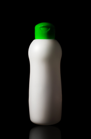 Bottle dish washing soap plastic isolated on black backgroundの写真素材