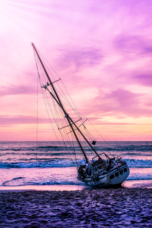 Boat on the beach in twilight and colorful of sunset, Seascape landscape natureの写真素材