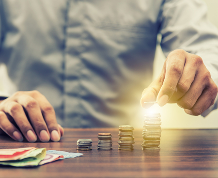 Save money and account banking for finance business concept, Business man with coin money on...