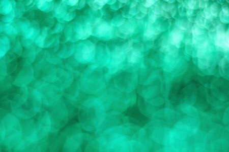 Abstract cyans light bokeh christmas light blurred backgroundの写真素材