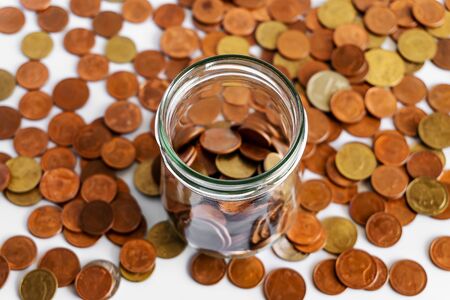 Growing money, Save money and account banking for finance business concept, Coin in bottle on white background, Savings for retirement and investing conceptの写真素材