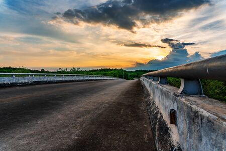 Road with bridge and tree nature in sunlight, Way and bridge in natureの写真素材