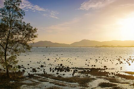 Sea sunset or sunrise with colorful of sky and cloud with sunlight in twilightの写真素材