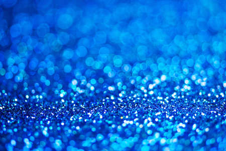 Glitter light abstract blue bokeh light blurred background