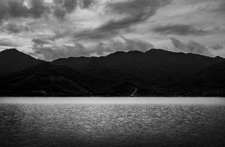 View of landscape nature and river and mountain in evening light, Black and white and monochrome styleの写真素材