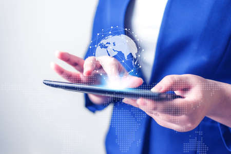 Business women with laptop on blurred background, Technology people connection network concept