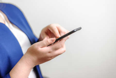 Business women with smartphone mobile on blurred background, Technology network and online banking...