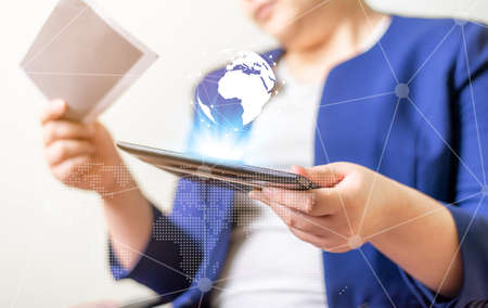 Technology network and online banking and internet banking and networking people concept, Business women with laptop and salary slip on brurred backgroundの写真素材