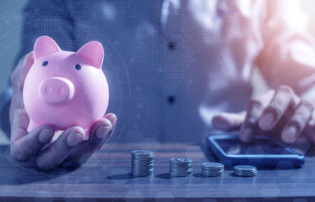 Investor online saving concept, Online Investment Savings, Online Stock Investors, Internet Financial Transactions, Save Monney for Investors Using Internet to Trade Stocks or Trade Fundの写真素材