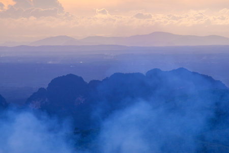 View of landscape nature and mist and mountain with sunlight and sunset or sunrise in morning light,...
