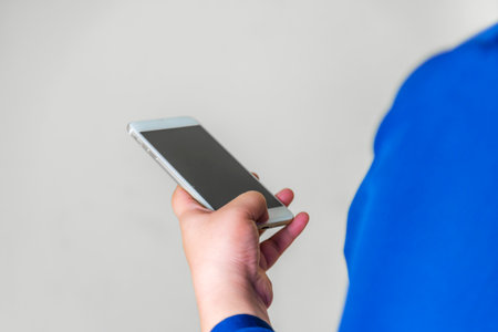 Global internet connection application and technology digital marketing, Financial and banking, Business women using smart phone mobile blurred backgroundの写真素材