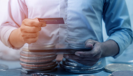 Online shopping and online banking and internet banking concept, Business man with phone, smart phone, mobile phone, laptop and credit card on white background, Investor and investing conceptの写真素材