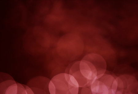 Light abstract dark bokeh christmas circle color glitter blurred black backgroundの写真素材