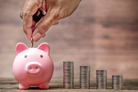Save money and account banking for finance concept, Piggy bank with coin on blurred background, Save Monney for Investors Using Internet to Trade Stocks or Trade Fundの写真素材
