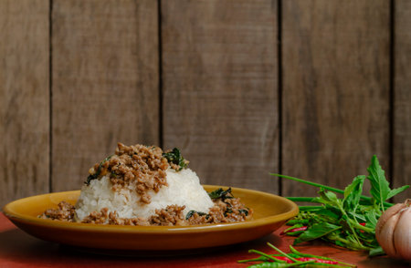 Minced pork with basil over rice is a Thai food that is popular among Thai people because it is delicious and easy to eatの写真素材