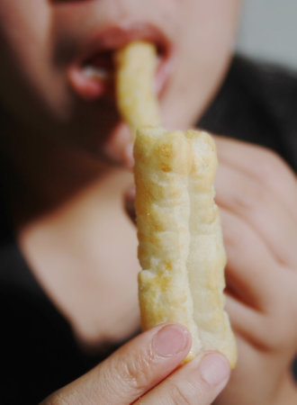 Woman holding crispy pastries, It is a popular street food that is delicious and commonly found in...