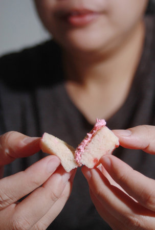 Woman holding cup cake, Soft blurred background