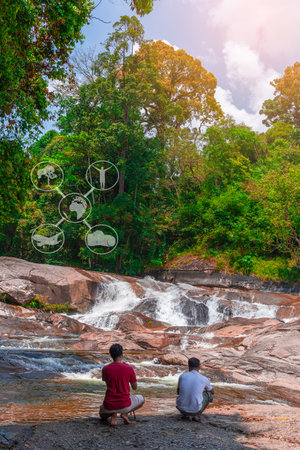 Green tourism, Sustainable tourism, Eco tourism, New tourism, Traveling with understanding without harming the Ecosystem, The mans photograph stone river water in forest, River stone in forest with photographerの写真素材