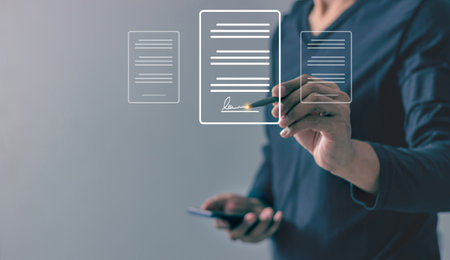 Young man uses a smartphone to sign a business contract online, Oline business contract, Electronic...
