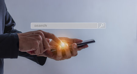 Young man hand using, holding, uses, smartphone mobile touching search bar, Search job