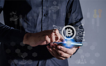 Investors in cryptocurrencies and bitcoin coins online, investors using mobile phones to trade...