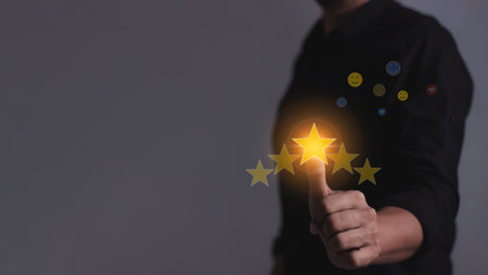 Customer Satisfaction, Young Man hand touching five star to review and give 5 stars with very good...