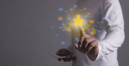 Excellence Review, Young Man with smart phone mobile hand touching five star to review and give 5...