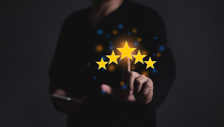 Happy Customer, Young Man using smartphone mobile hand touching five star to review and give 5 stars...