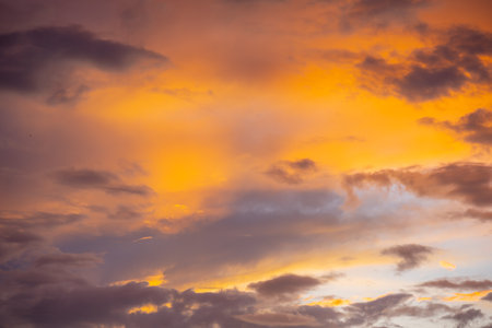 Abstract and pattern of cloud sky. Calming coral, Orange, Pattern of colorful cloud and sky sunset or sunrise: Dramatic sunset in twilight, Beautyful of skyの写真素材