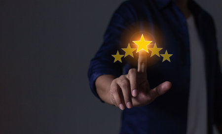 Happy Customer, Young Man hand touching five star to review and give 5 stars with very good results...