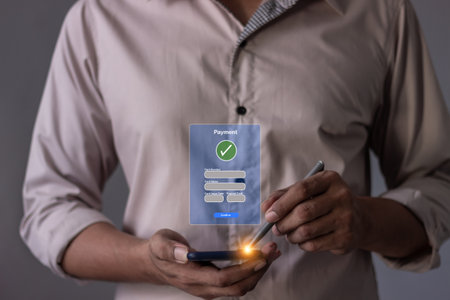 Young Man Hand Using Smartphone For Mobile Payment, Online payment, Digital, and Online shopping,...