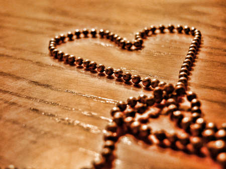 Shows a silhouette of a heart with a chainの写真素材