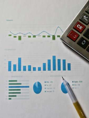 Graphics table with a calculatorの写真素材