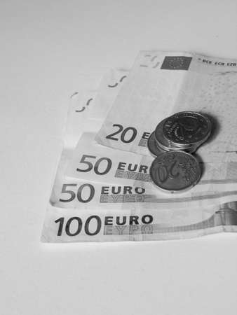 bills and money on white backgroundの写真素材