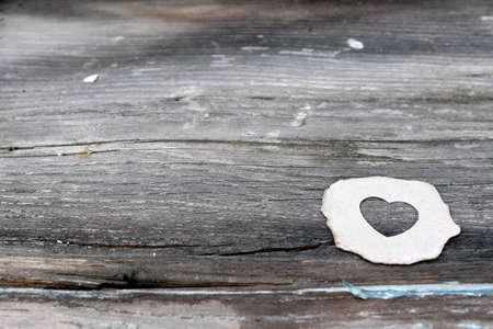 heart on wood background textureの写真素材