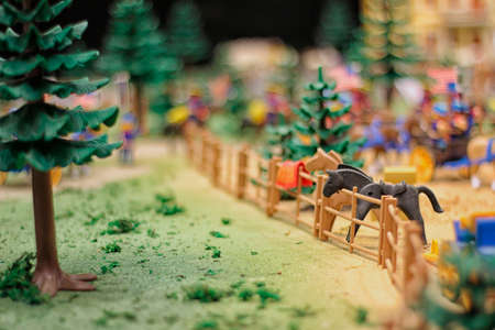 black horse grazing in the field, playmobil