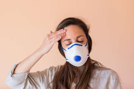 pretty brunette girl with mask to prevent corona virus disease