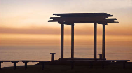 Sunrise over the Big Sur Coast with gazebo in foregroundの写真素材