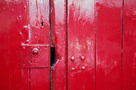 Bright red gloss painted door texture backgroundの写真素材