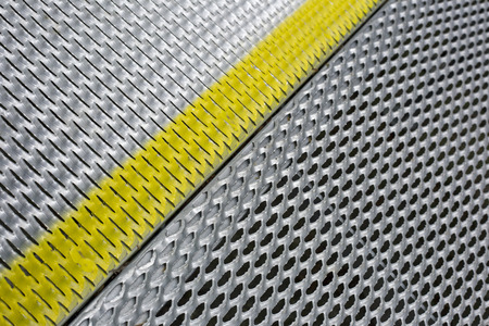Aluminium mesh shot for use as a backgroundの写真素材