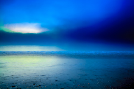 As night turns into day seascapeの写真素材