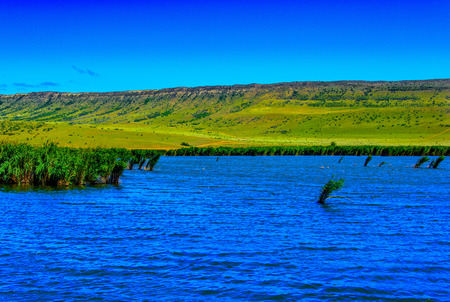 Windy pristine lake with small wavesの写真素材