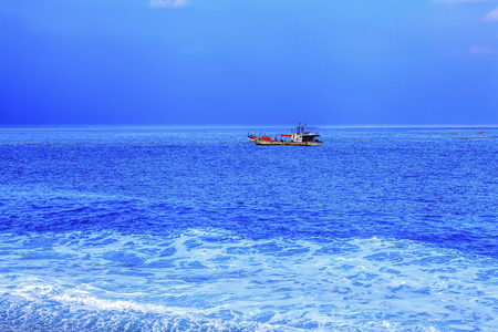 Chinese fishing junk choppy sea seascapeの写真素材