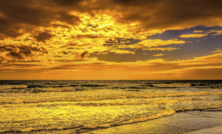 Sunset seascape isolated beachの写真素材