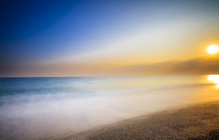 Long exposure sunrise seascape Taiwan beachの写真素材