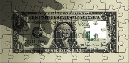 Photo illustration of a dollar as a puzzle with a missing piece.の写真素材