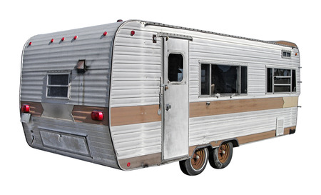 A recreational vehicle trailer from the past, isolated from the background. Also contains a clipping path.の写真素材