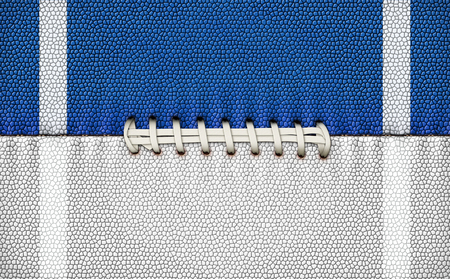 Digital Illustration of a football?s texture, laces, and stripes to use as a background for text or other graphics.の写真素材