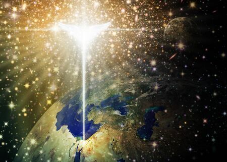 Digital illustration of the Christmas star and angel shining down over Bethlehem, as viewed from outer space. Space and stars are digitally illustrated. Credit NASA for earth and moon images.の写真素材
