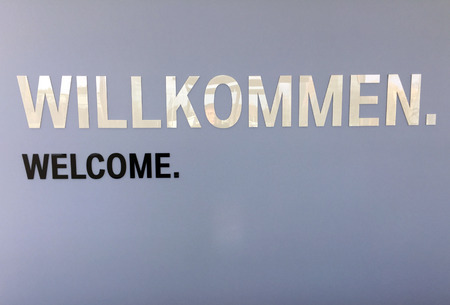 Welcom sign, written in both English and German with ample copy space for your message.の写真素材